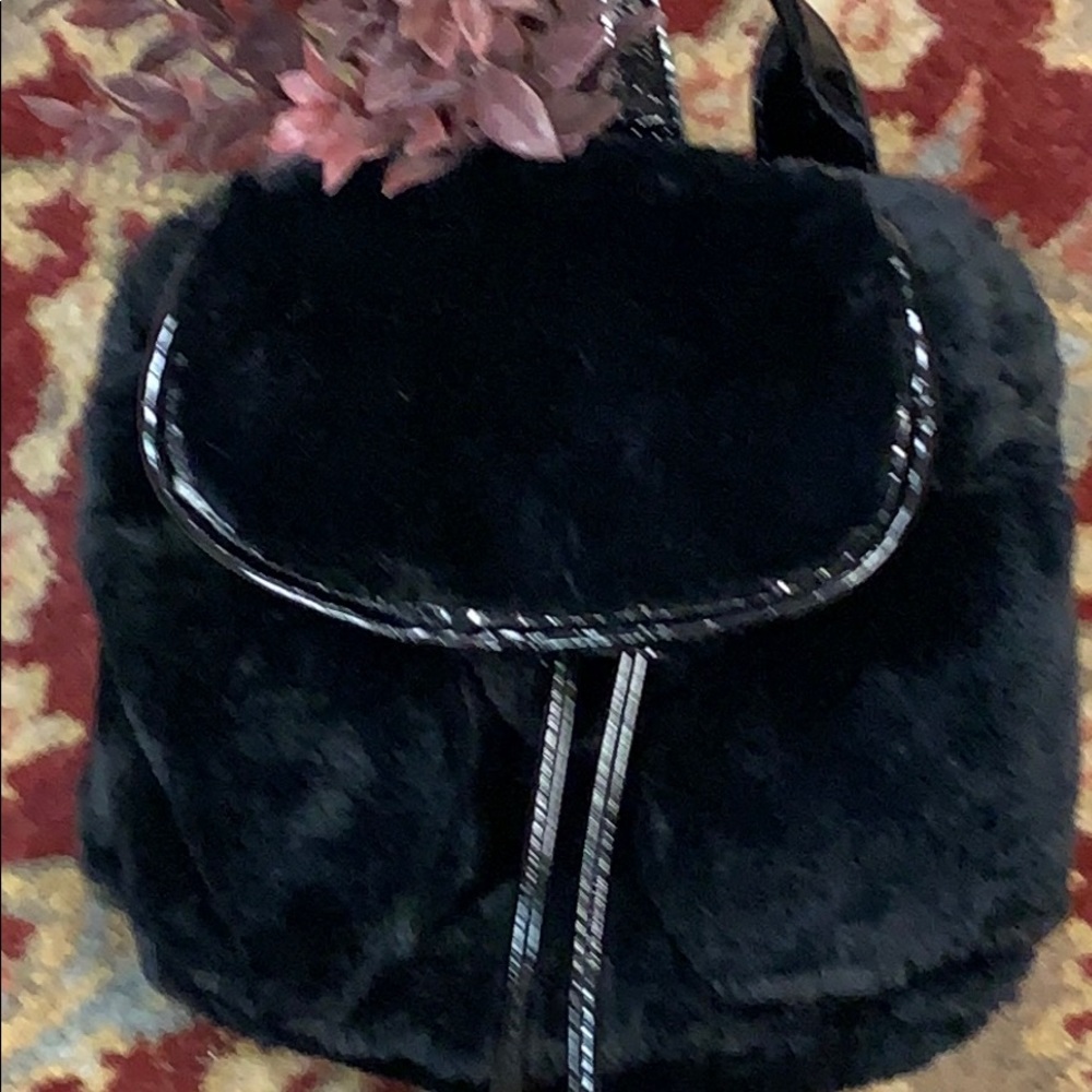 Black fur backpack